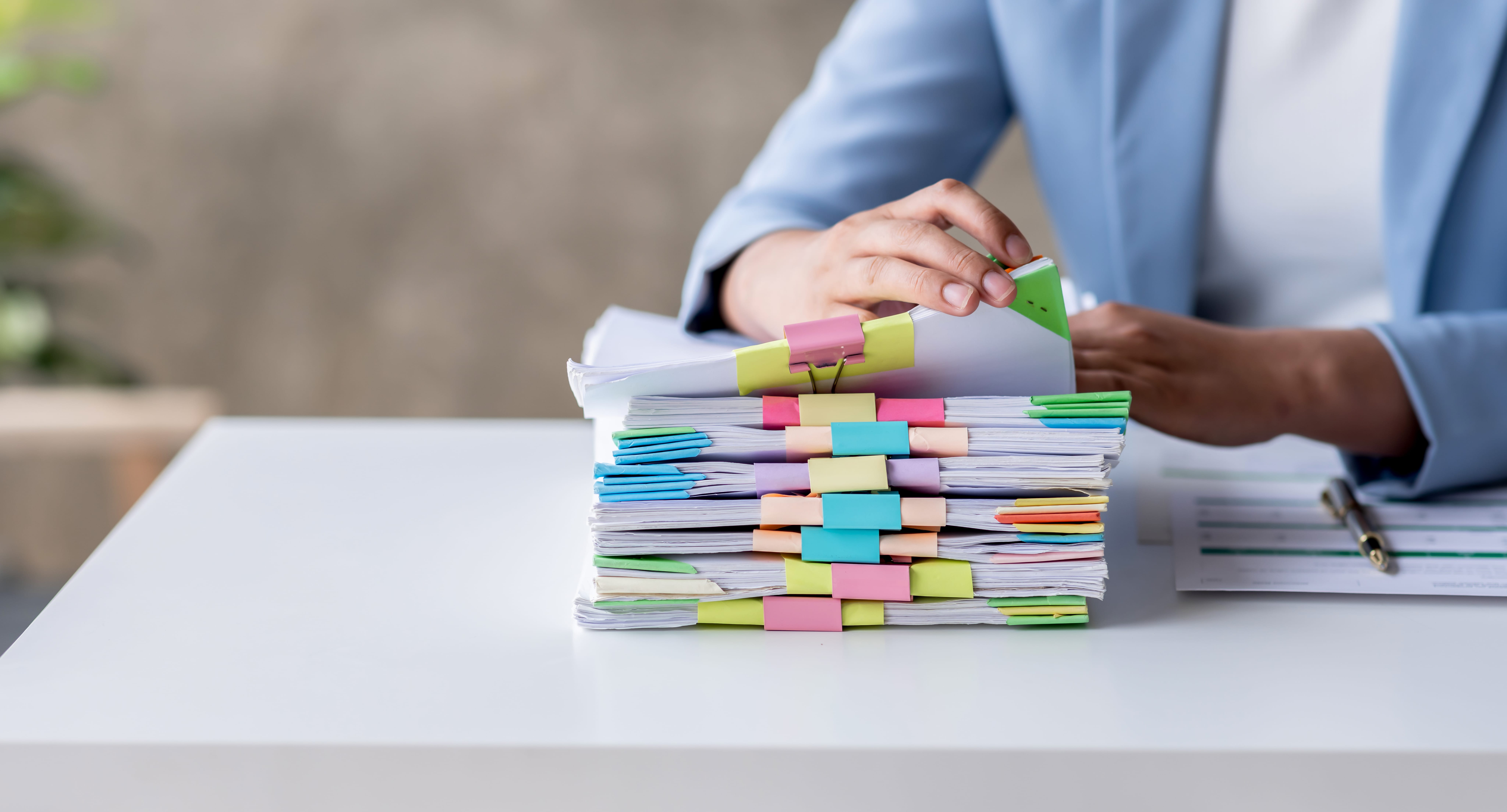 woman completing paperwork